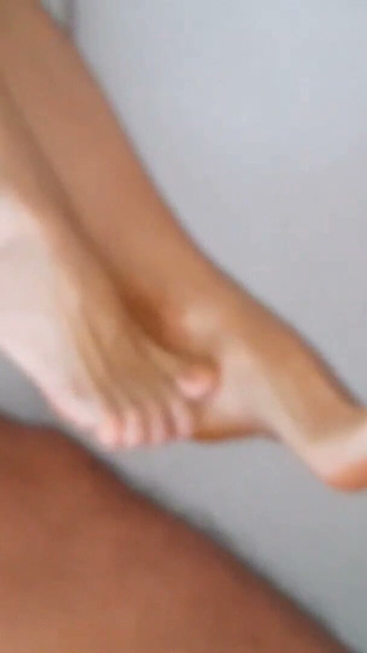 Selena's relaxing in bed and footjob | Clip 1