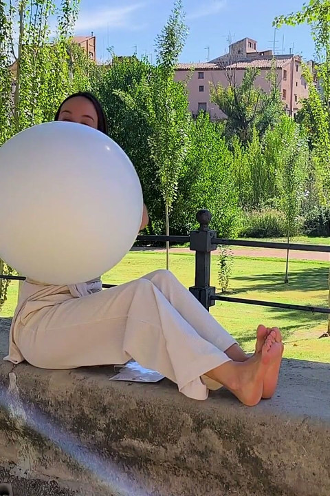 Inflating and Popping Them with Bare Feet Outdoors
