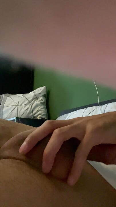 Me jerking my self off on the bed and cumshot for you showing my shaved Dick.