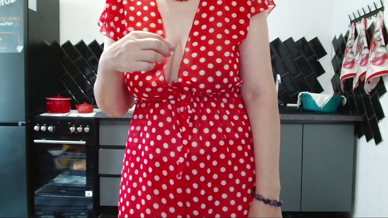 her polka-dot dress spread to the sides