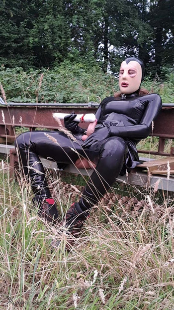 latex sissy cum outside with a vibrator