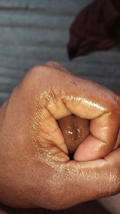 Doing massage of penis with oil