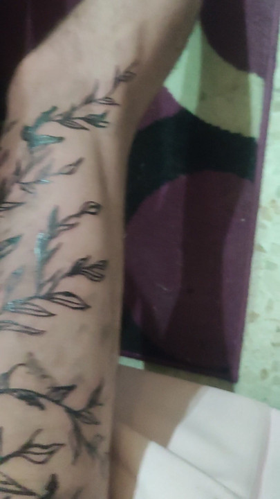 Tattooing his cock