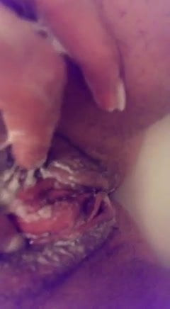 My ex playing with her creamy pussy