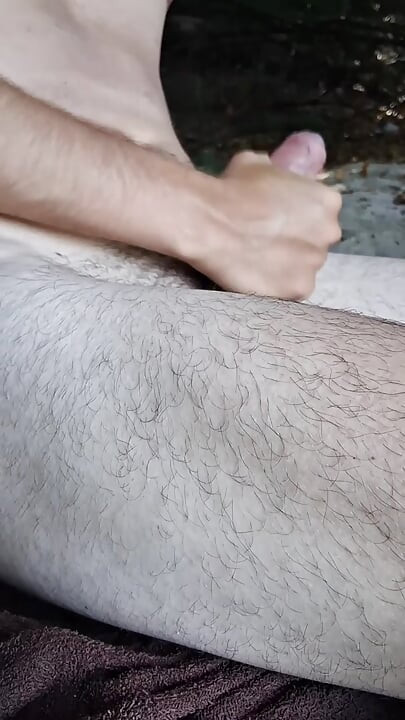 Jerking off hot in the river