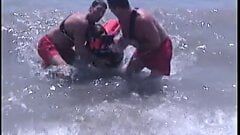 Guy get his thick cock sucked by two lifeguards at same time