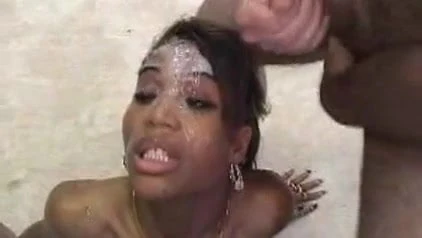 Black Slut Takes Heavy Cum Facials From White Cocks