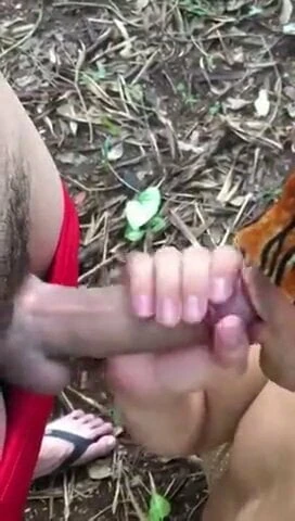 Masked men blowjob in forest