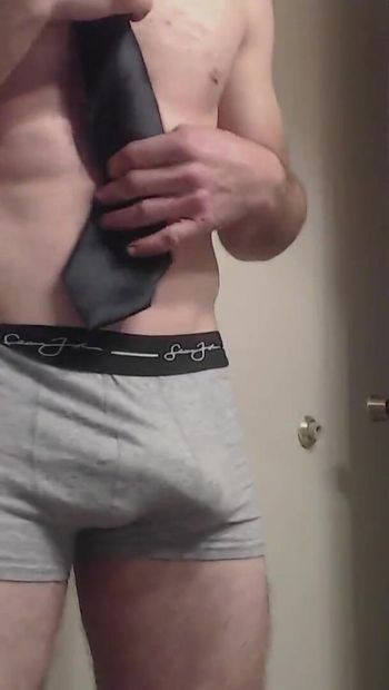 Ripped dude striptease