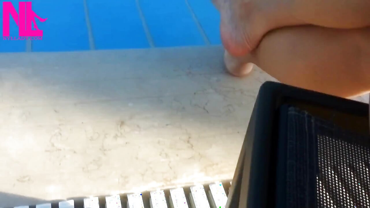 Barefoot Dangling in Swimming Pool Water