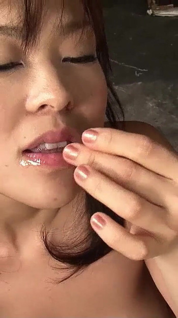 Thrilling moment from "Japanese MILF with perky Big Tits seduce to Double Blowjob by two Guys"