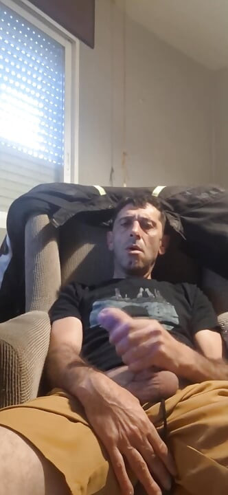 Guy masturbating on the sofa