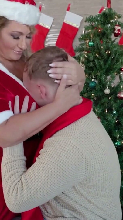 The Kind And Giving Mrs. Claus Takes Joshua's Face And Pushes It Right Into Her Huge Tits | Clip 1