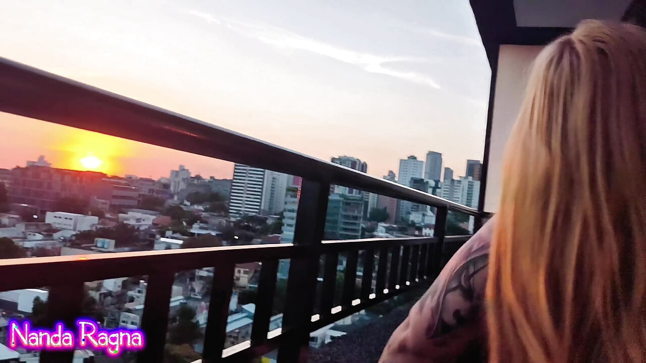 I gave a wet blowjob and sat on my neighbor's cock on the balcony of the building