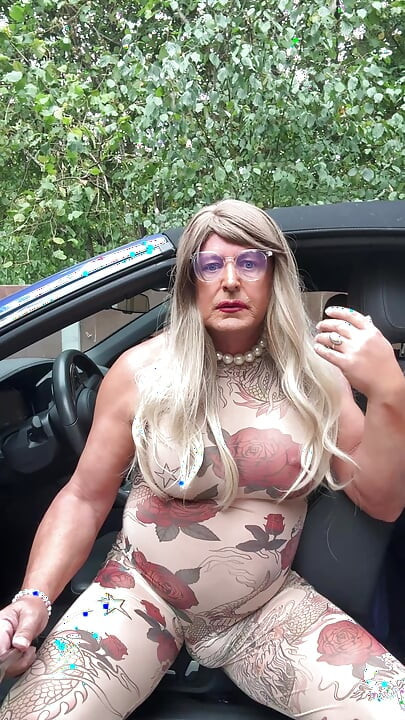 Sexy Crossdresser kellycd2022 in sexy floral see thru catsuit and heels