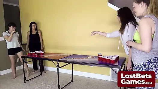 Four hot lesbians playing a Strip Air Pong game