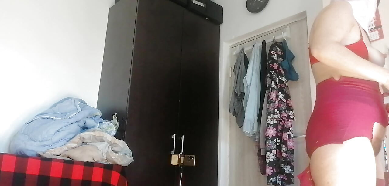 Amateur wife has fun trying on clothes and cutting them. Amateur wife vacuuming naked in the house.