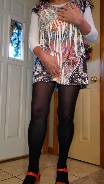 Memorable moment from "Crossdresser in my sexy new mini dress."