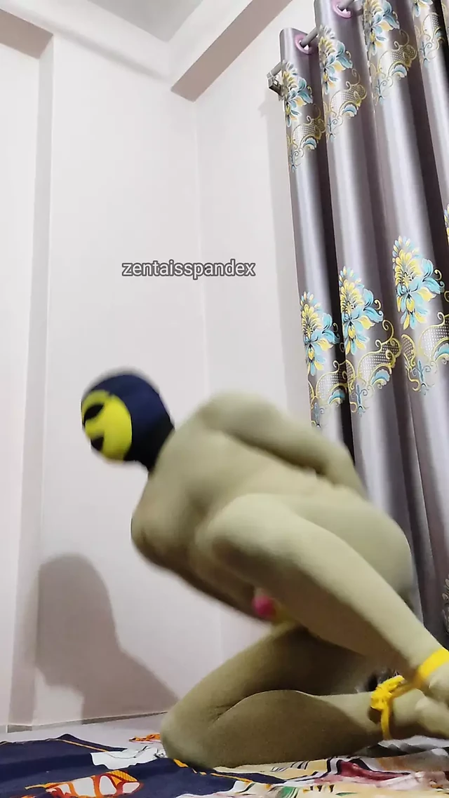 Zentai spin head round challenge with blindfolded tied hand
