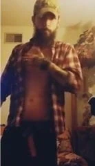 bearded man cums and tastes it