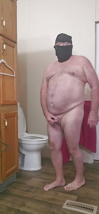 Nasty completely nude exhibitionist in the bathroom.