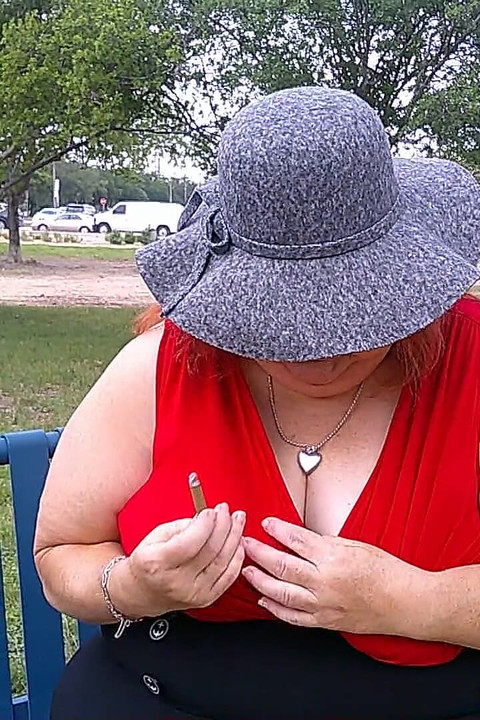 Nurse Vicki Smoking in the Park on a Bench All Dressed up