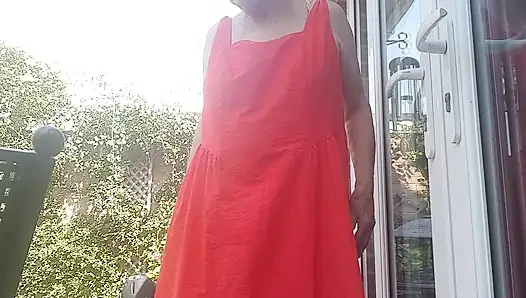 Lady in red in the sunshine