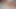 Beautiful milf is tied up, body bandaged, Masturbating her clit. She moans and screams. Listen to her screams, they're sweet.