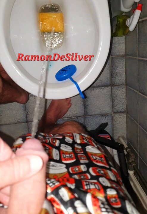 Master Ramon pisses in hot satin shorts on his slave's cleaning sponge, evil