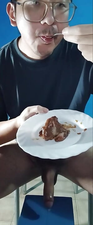 Asian guy with a big long cock, masturbating and spitting cum, after that eating his own cum.