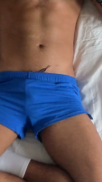 Muscle Man Streams Big Bulge In Blue Shorts | Clip 3