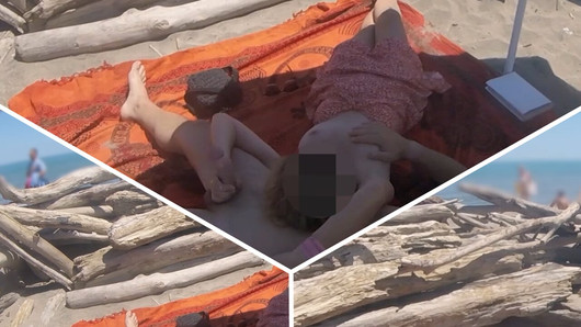 Esibizione insegnante all'aperto Amatoriale Milf sega un Grosso Cazzo in pubblico nella spiaggia nudisti di fronte a guardoni con sborrata 2