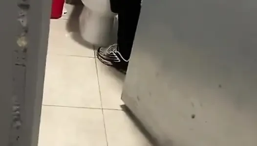 Boy Opens Cubicle and Catch His Friend Peeing