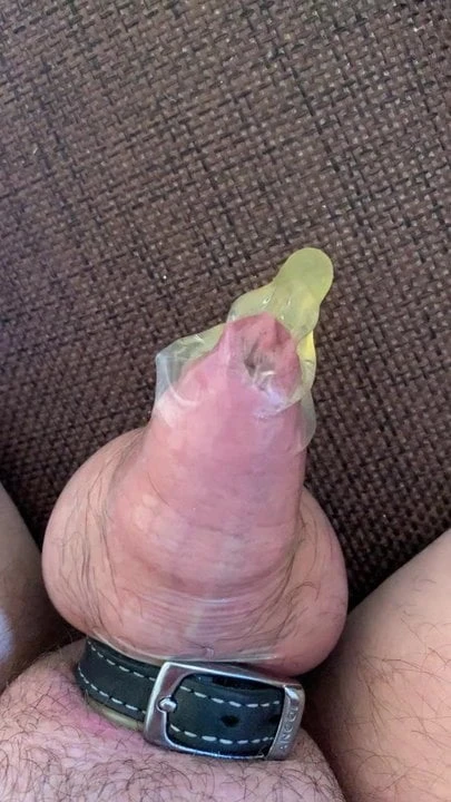 Wearing A Condom Filling It With Piss