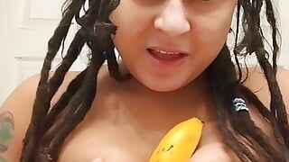 Dollie plays with herself with banana and dildo