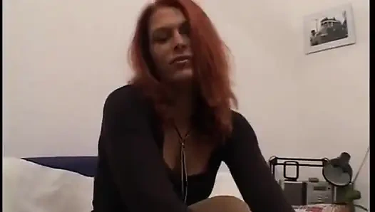 Lovely redhead babe pleasing her pussy with a vibrator