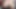 Short clip of Anonypuss popping tits out of a short black dress and wiggling them about