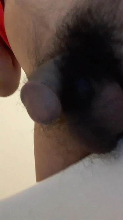 Pakistani man peeing on his ballsack