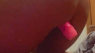 Thick ebony has fun with pink dildo toy