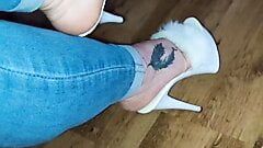 Horny MILF in jeans with white heels