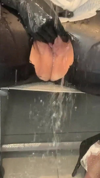 Powerful moment from "Shower Masturbation and Pissing in Leggings and PVC Boots"