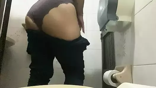 Nurse pissing in hospital bathroom