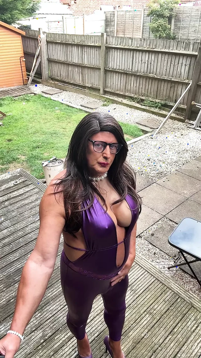 Sexy Crossdresser kellycd2022 in purple pvc catsuit and heels