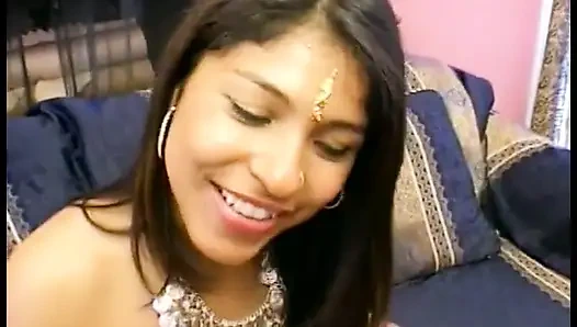 Lusty brunette dressed in Indian Style seduces two horny dudes