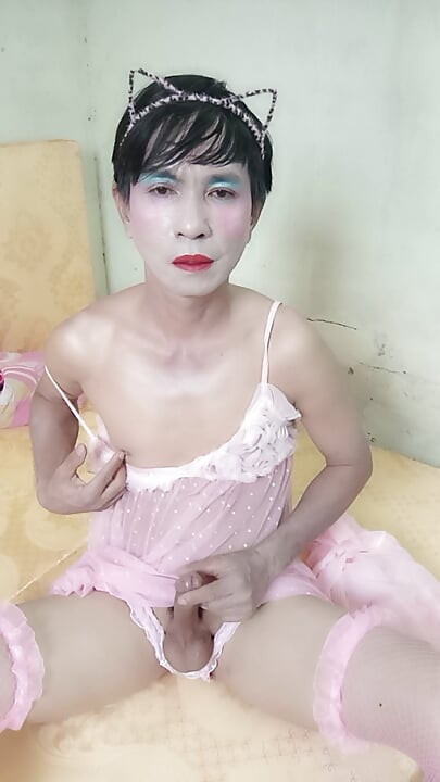 Oanh Le transgender wearing a sexy robe masturbating happily