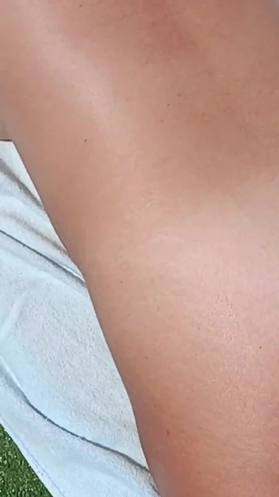 Epic moment from "Sexy french milf sunbathes naked and rubs sunscreen in her tanned vody"