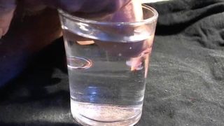 cum into a glass of water
