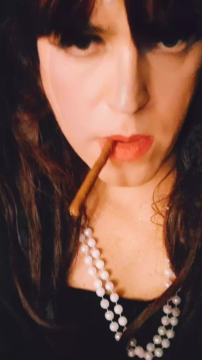 JoanaLoveTs smoking and showing huge cock