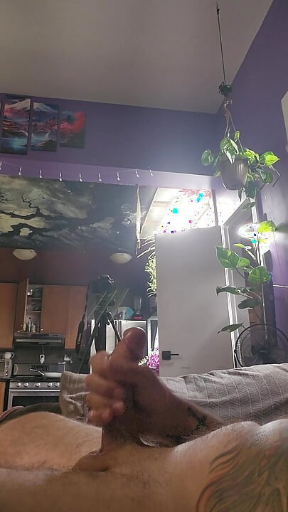 close up of big cock lubed up being stroked till it cum