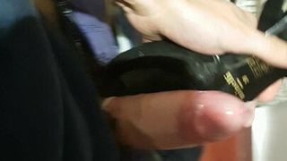 Wanking with a heel shoe in public (fitting room)